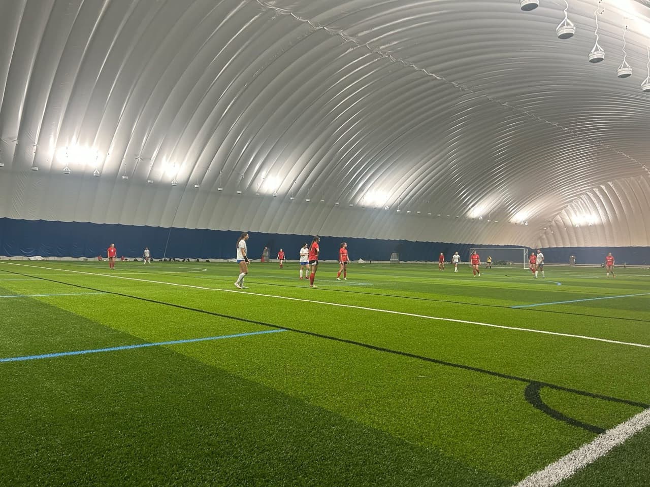 Players on the indoor turf